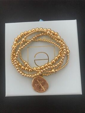 Gold Beaded Bracelet Stack with Cross Charm